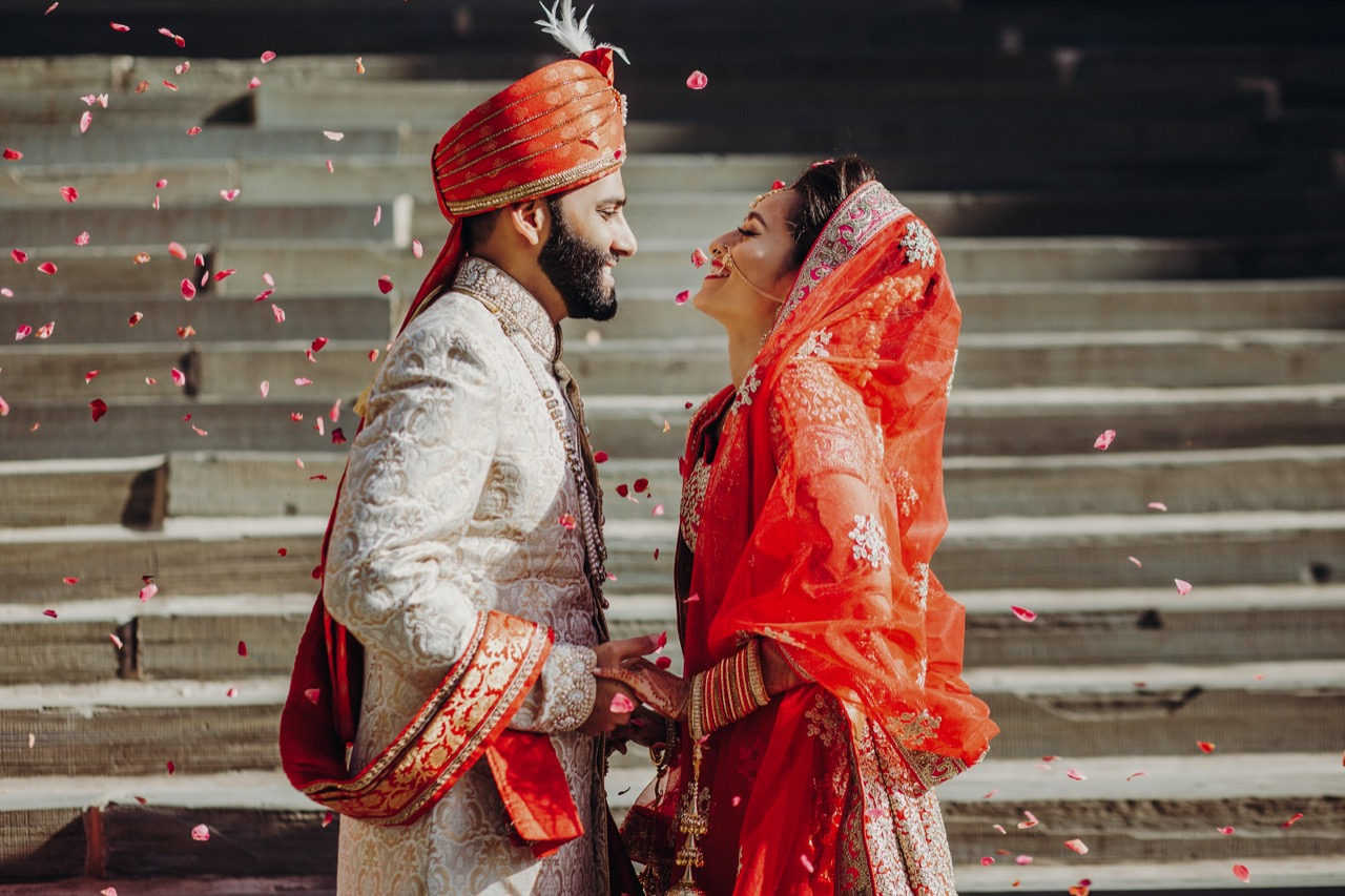 Newlywed Indian couple in traditional wedding attire